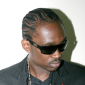 Busy Signal Arrested on Extradition Warrant